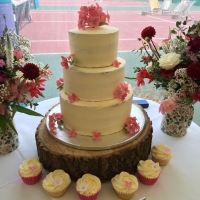 Pink hydrangea semi-naked wedding cake