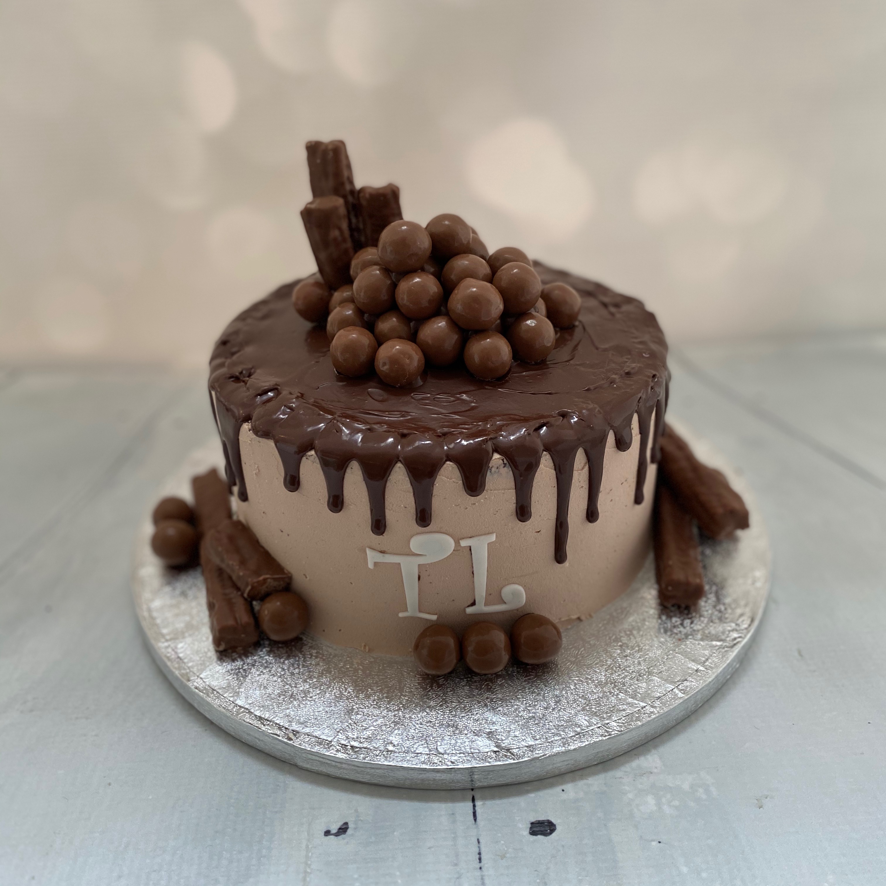 Flake &amp; maltesers chocolate drip cake