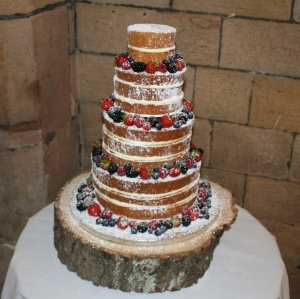 4 tier naked cake with berries