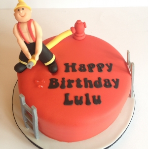 Cheeky fireman cake