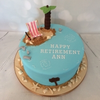 Beach theme retirement cake