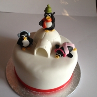 Cute penguins Christmas cake
