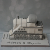White and silver steam train wedding cake