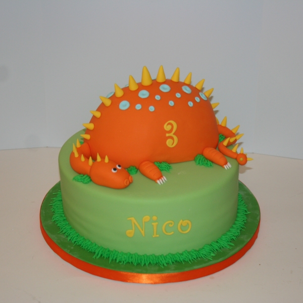 Orange dinosaur cake