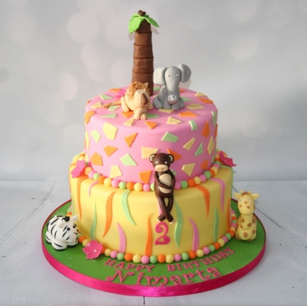 Safari themed cake in candy colours