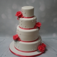 Coral &amp; pearl wedding cake