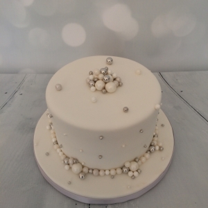 Small white pearls wedding cake